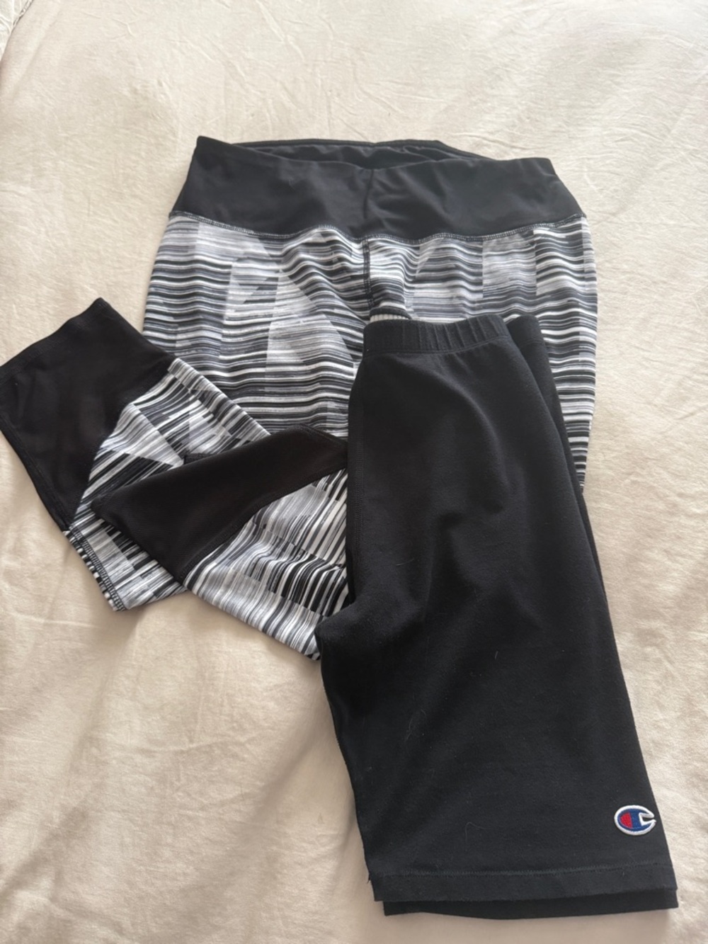 Both pair included.  Champion Black workout shorts and B&W RBX yoga pants.